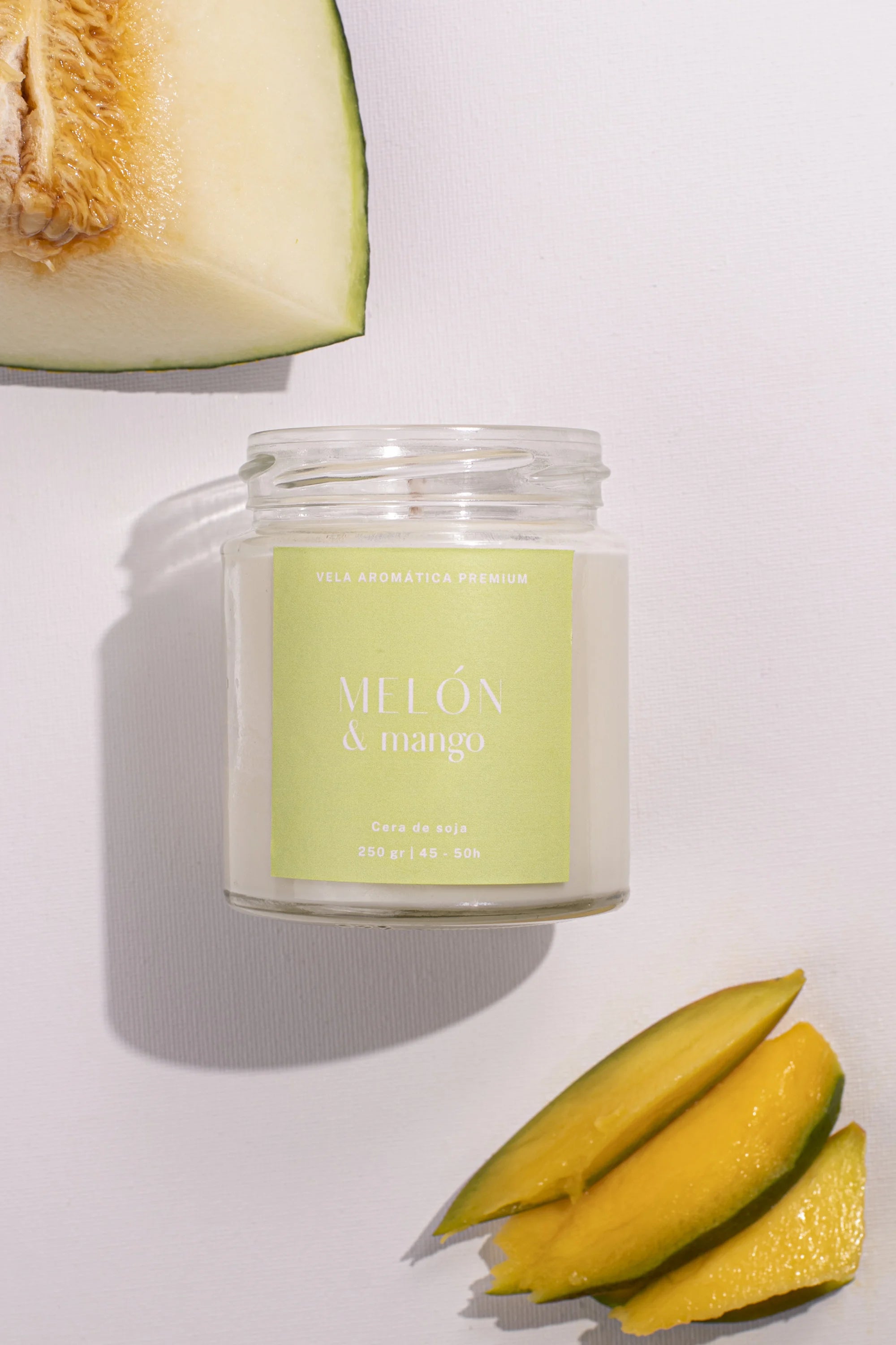 Vela aromática artesanal de melón y mango