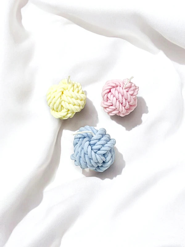 Vela decorativa ovillo de lana